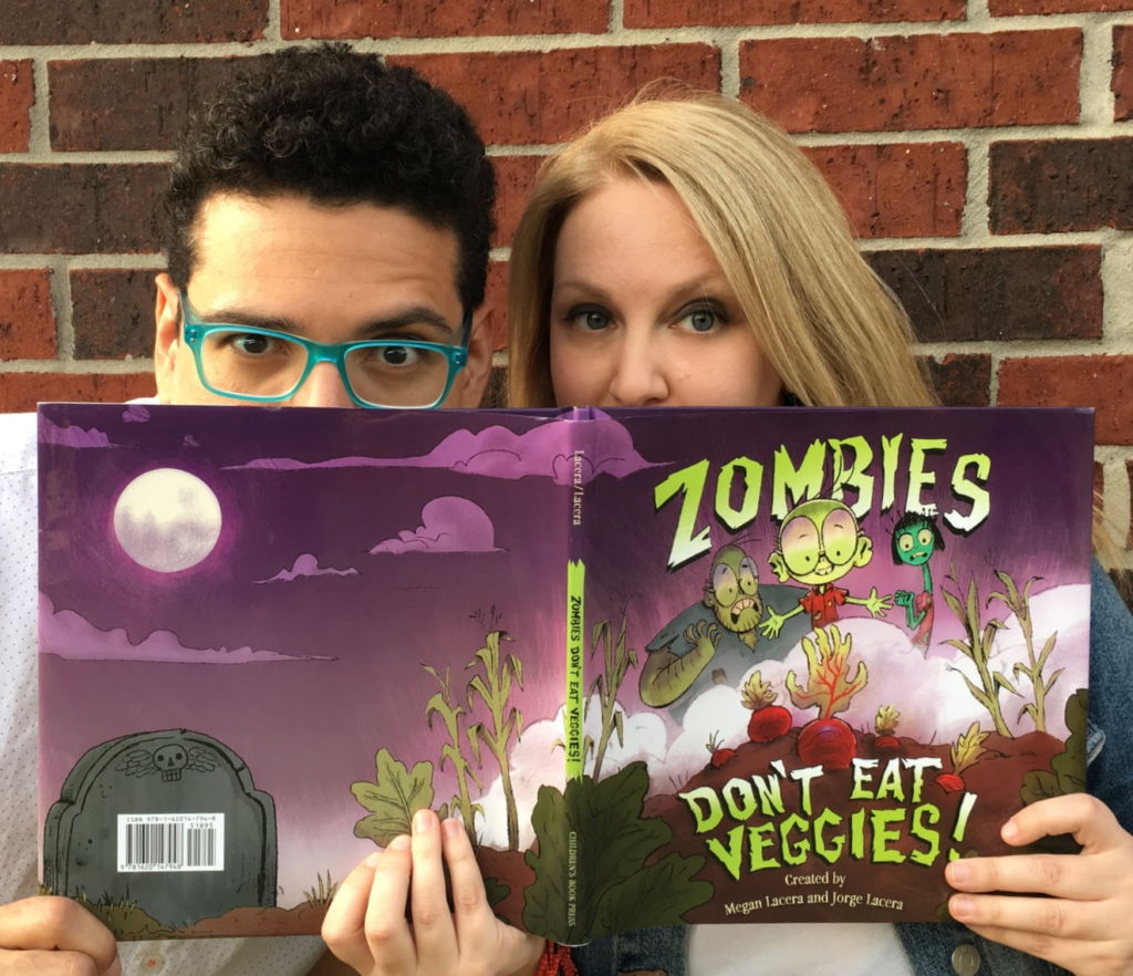 Jorge and Megan Lacera with a copy of Zombies Don't Eat Veggies